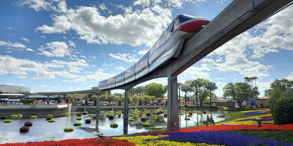 Red monorail over EPCOT during Flower & Garden Festival