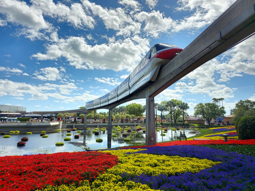 Red monorail over EPCOT during Flower & Garden Festival